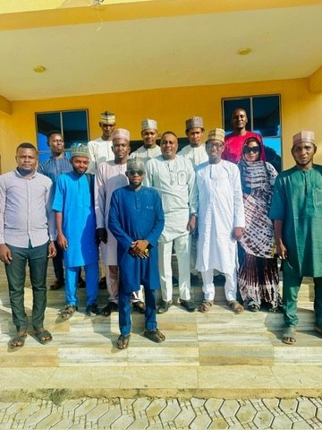 Community stakeholders with Yusuf Garba