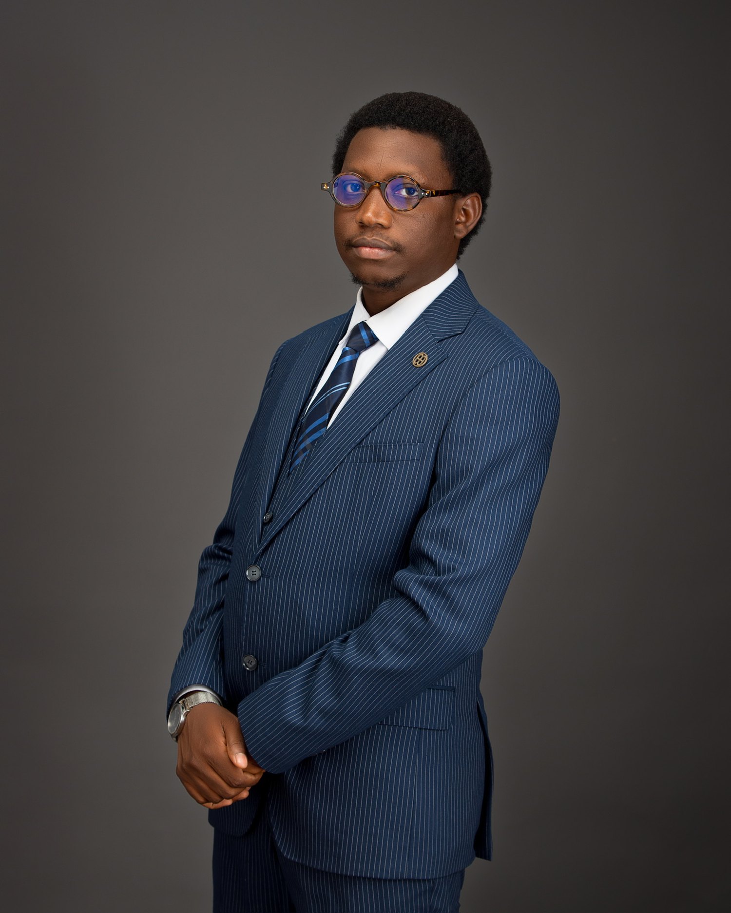 Yusuf Garba in a blue suit